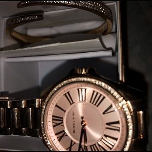 Micheal kors rose gold watch + bracelet.